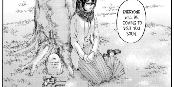 Mikasa sitting next to Eren's grave in the final chapter of Attack on Titan