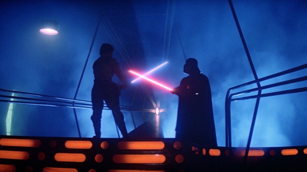 The epic lightsaber battle between luke skywalker and darth vader from star wars: the empire strikes back - both in silhouette - top 25 best lightsaber battles in star wars!