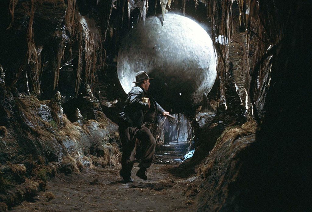 Indy running from a giant boulder in "raiders of the lost ark"!